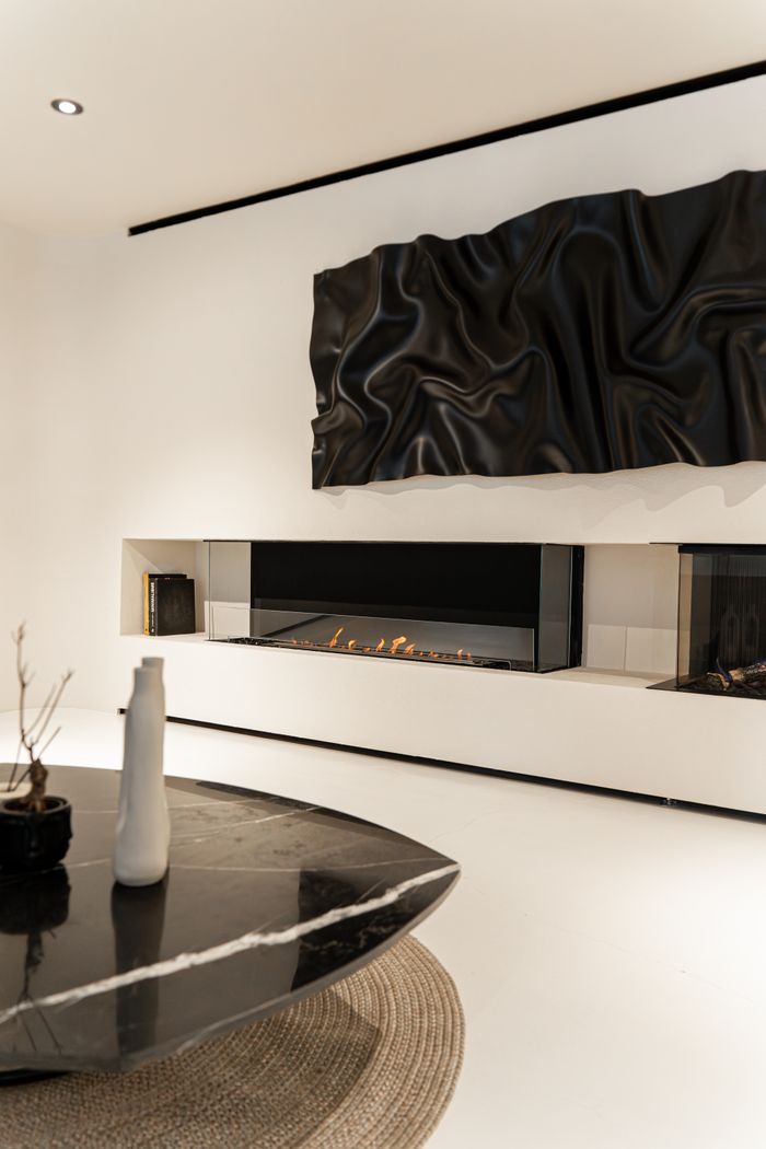 Crafting Captivating Headlines: Your awesome post title goes here Contemporary living room featuring a minimalist fireplace and chic decor elements.